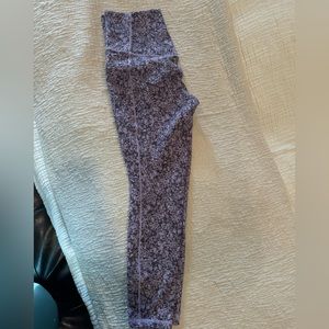 Purple floral Athleta salutation pocket 7/8 leggings.